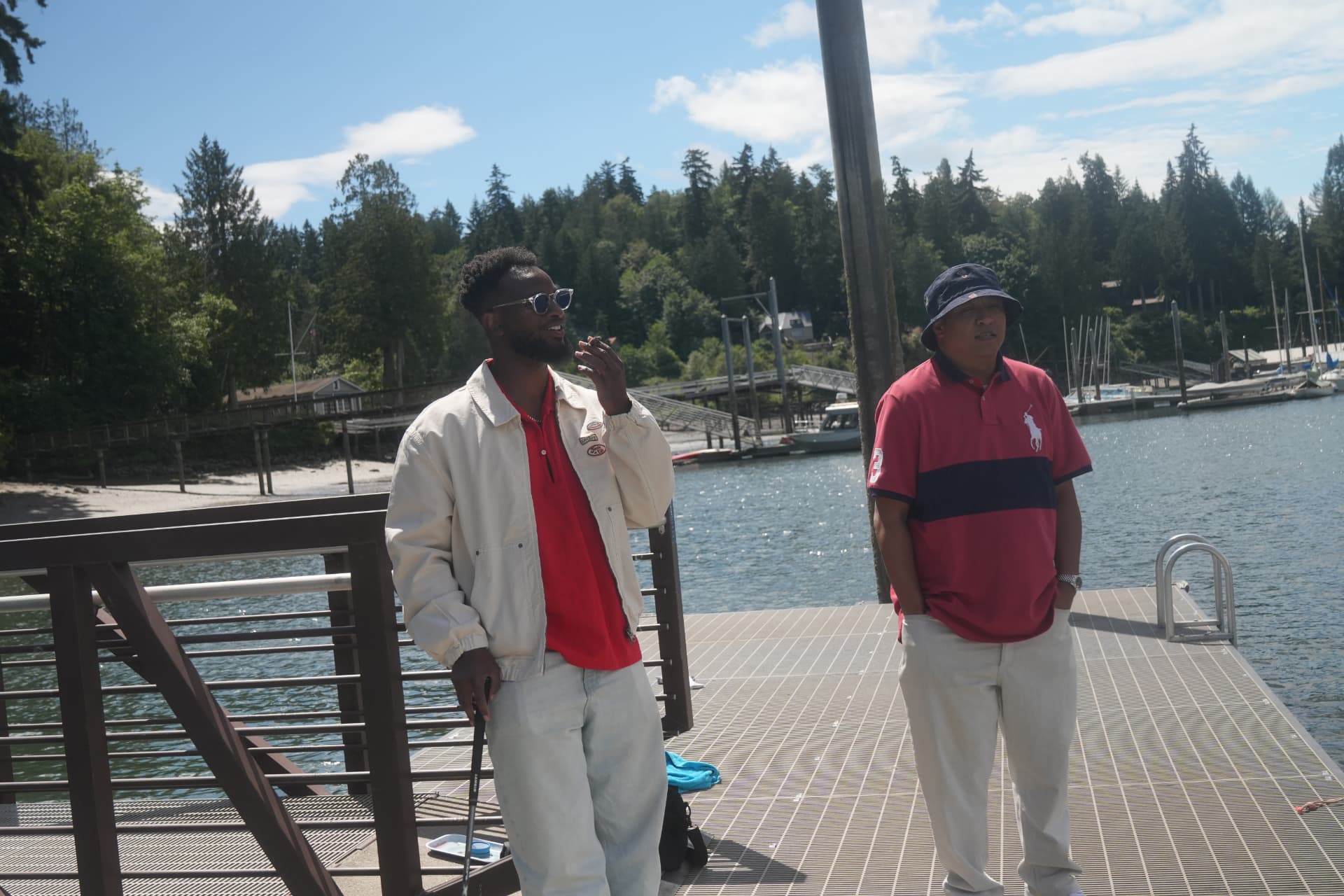 Pinder and Language Arts on a dock by the water